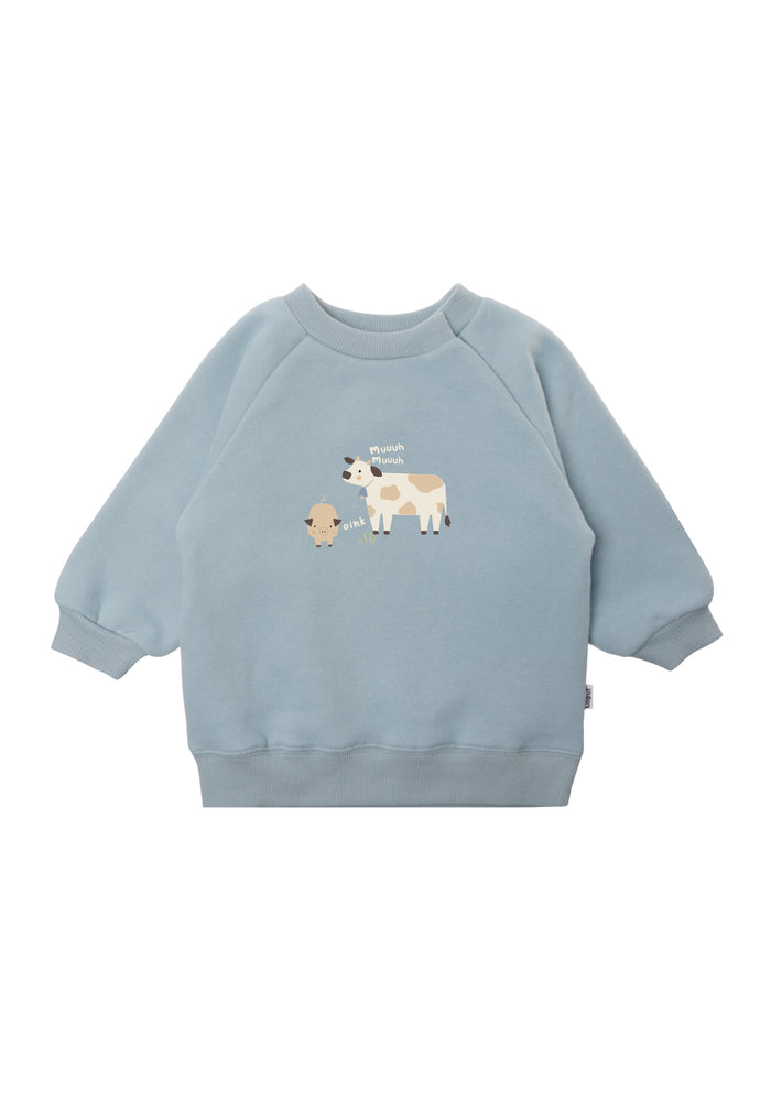 Hellblaues Sweatshirt mit Bauernhof Print.