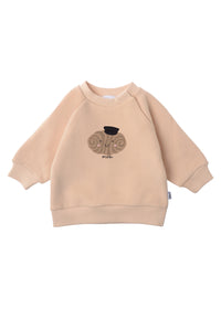 Sweatshirt in beige mit niedlichem Franzbrötchen Aufdruck.