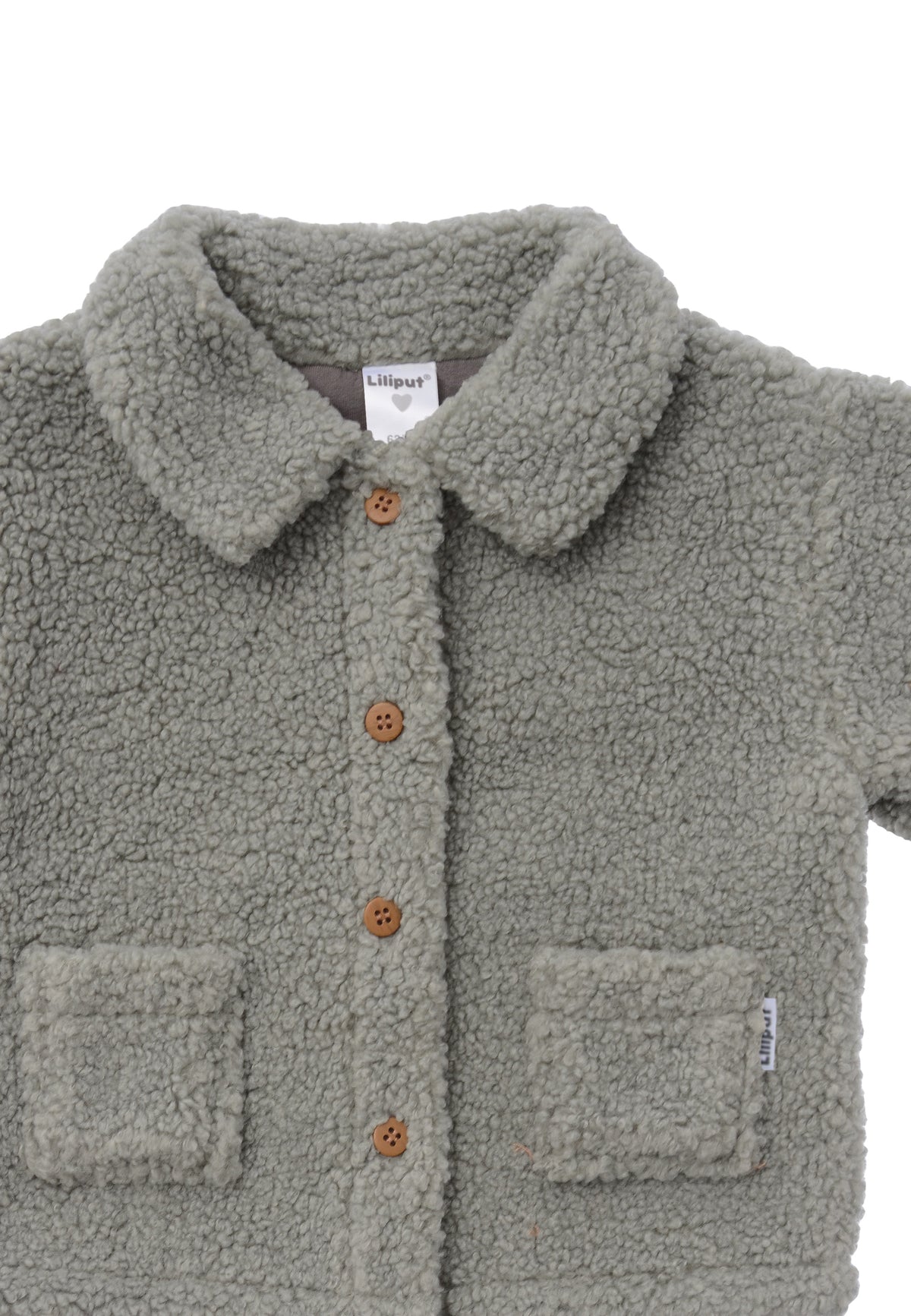 Bouclèfleece Jacke mit Knöpfen zum schließen.