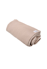 Detailaufnahme Musselindecke in braun.