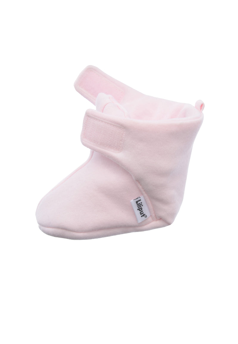 Babyschuhe mit praktischem Klettverschluss in zartem rosa.