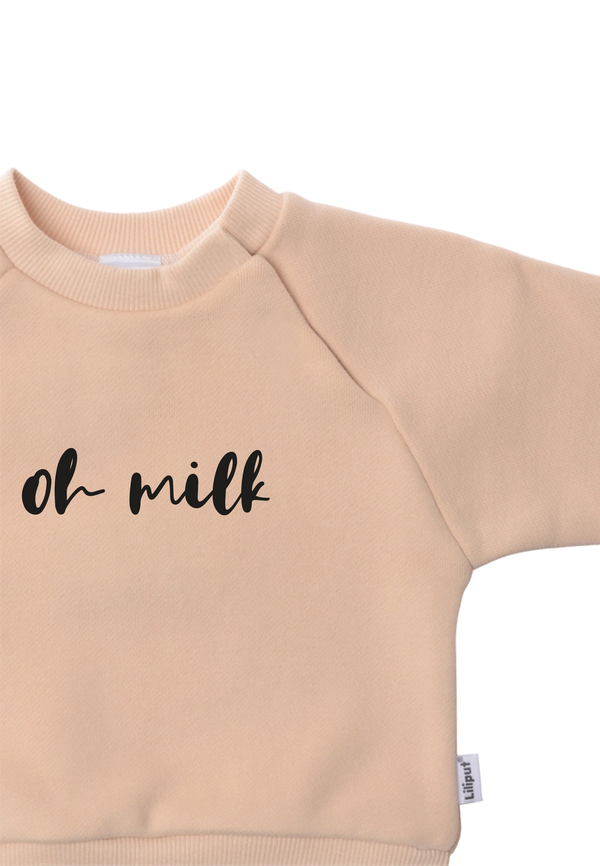 Detailansicht des beigen oh milk Sweaters.