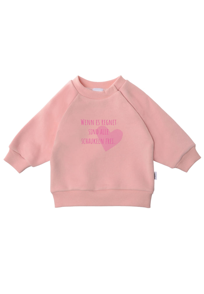 Sweatshirt in rosa mit coolem Wording "Wenn es regnet sind alle Schaukeln frei."
