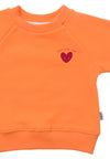 Im Detail Sweatshirt in orange mit Print "Selflove Club"