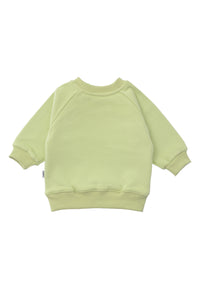 Rückseite vom Sweatshirt in der hellgrün mit "smily" Print