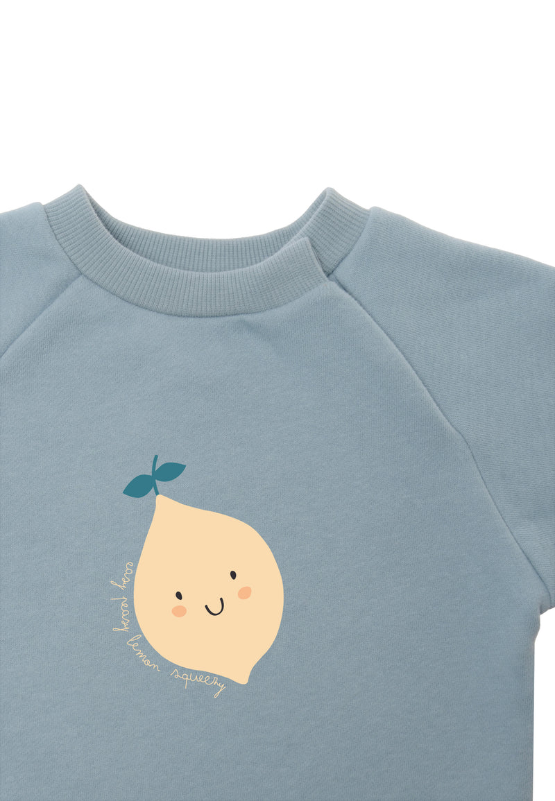 Weitere Detailansicht des Zitronen Prints mit dem Wording "easy peasy lemon squeezy".