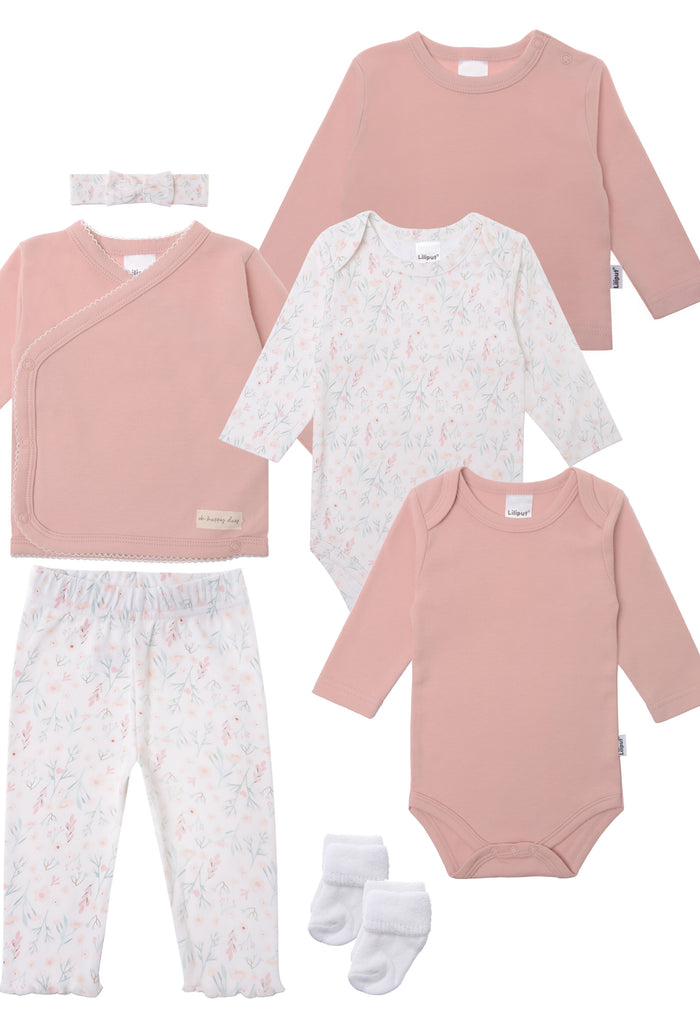 Detailansicht des 8 Teiligen Baby Sets in rose und mit Blümchen Muster.