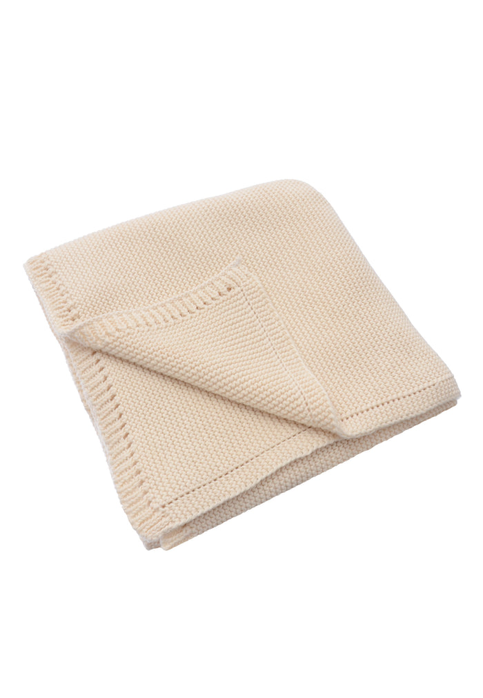 Strickdecke in 90x90cm in sanftem beige.