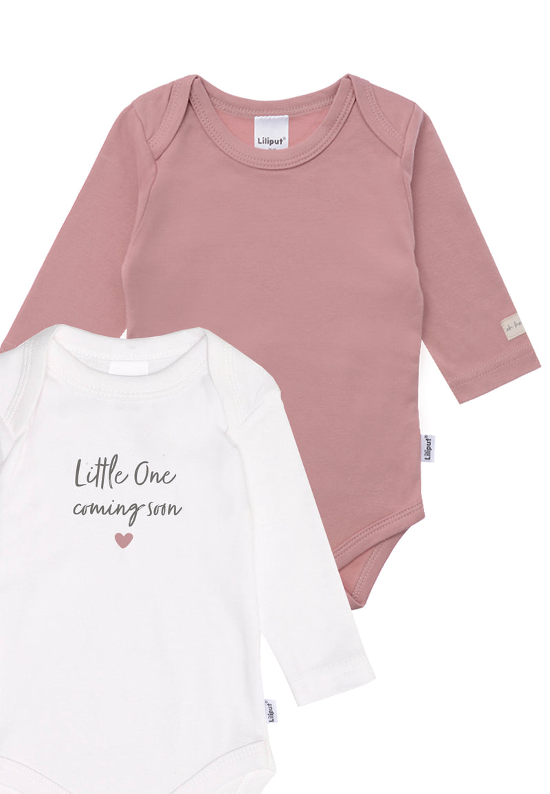Detailansicht des Doppelpack Bodys in rosè und weiß.