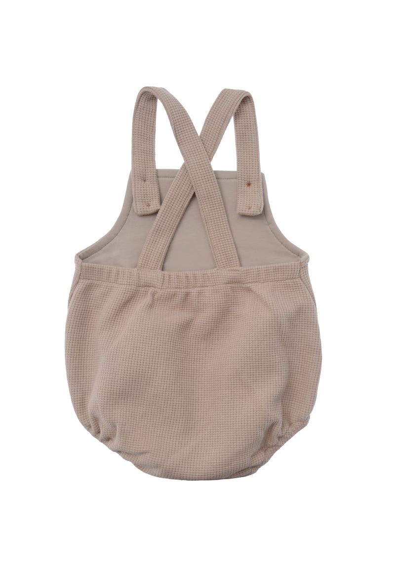 Baby Latzhose aus Waffelpiquè beige