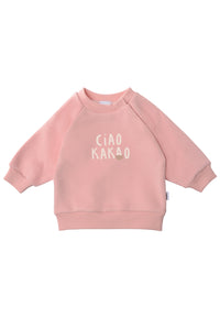 Rosa Sweater mit versteckter Druckknopfleiste und hellbeigem Spruch Ciao Kakao in der Mitte des Sweaters.
