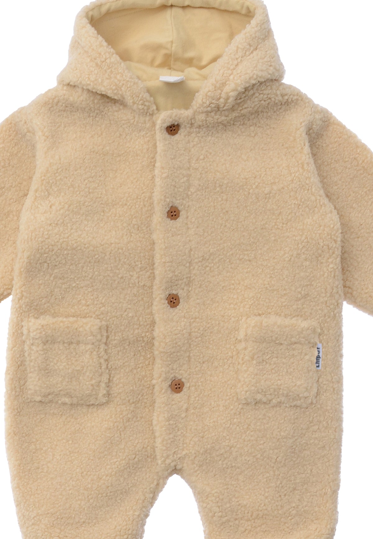 Detailansicht des Winteroveralls aus Bouclèfleece.