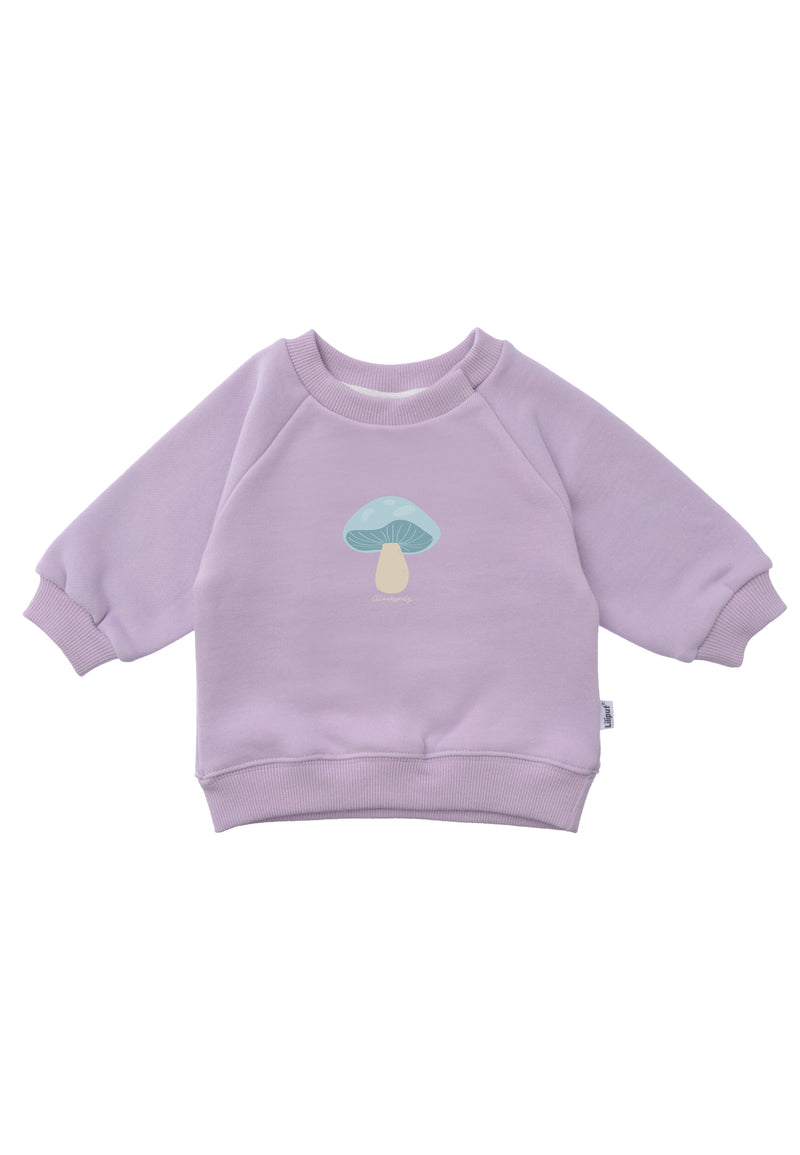 Flieder farbendes Raglan Sweatshirt mit Glückspliz Aufdruck.