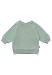 Sweatshirt mit Raglanärmeln in der Farbe schilf mit weichen Ribbündchen.