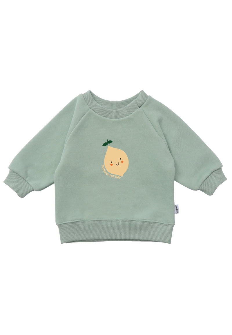 Frontansicht des schilf farbenden Sweatshirt mit Zitronen Print auf der Vorderseite.