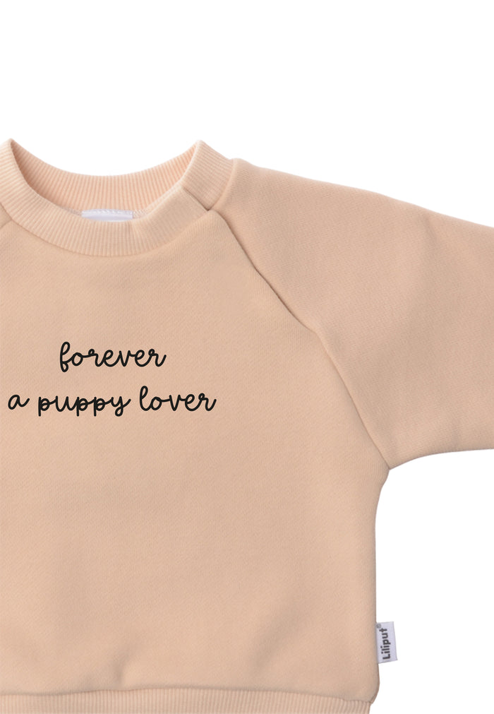 Detailfoto beiges Sweatshirt mit Ribbündchen und coolem Aufdruck