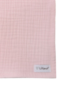 Detailaufnahme rosa Musselintuch.